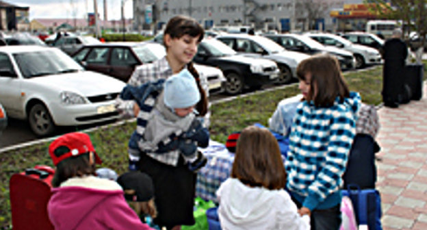 Chechen refugees-returnees from Poland to Chechnya. Photo by the Information Agency "Grozny-Inform" (www.grozny-inform.ru)