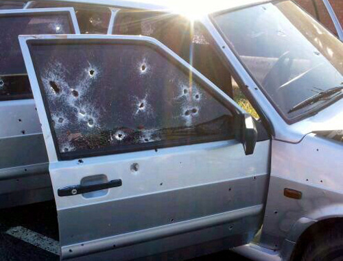 The car in which Akhmed Kotiev and his driver were killed. Ingushetia, Malgobek District, Nizhnie Achaluki. August 27, 2013. Photo by press-service of Ingush MIA. The car in which Akhmed Kotiev and his driver were killed. Ingushetia, Malgobek District, Nizhnie Achaluki. August 27, 2013. Photo by press-service of Ingush MIA.