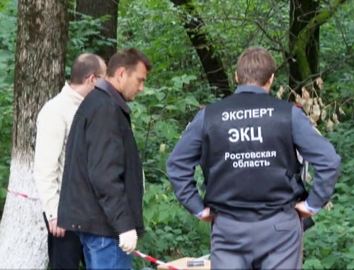 Investigating group at the spot of the skirmish with a gang that committed attacks on policemen. The city of Aksai, Rostov Region, September 8, 2013. Snapshot of a footage by the press-cutting service of the Russian Ministry of Internal Affairs (MIA) for the Rostov Region Investigating group at the spot of the skirmish with a gang that committed attacks on policemen. The city of Aksai, Rostov Region, September 8, 2013. Snapshot of a footage by the press-cutting service of the Russian Ministry of Internal Affairs (MIA) for the Rostov Region