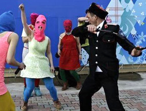 A brawl between Cossaks and Pussy Riot band and the art-group "Voina" members. Sochi, February 19, 2014. Photo from activists’ Twitter account, http://twitter.com/gruppa_voina/status/435830304725794816/ 