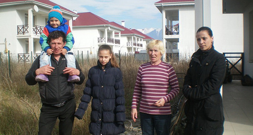 The Saveliev family at their new 'home'. Photo by Alexei Saveliev