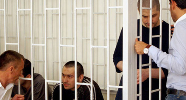 The defendants in the case of the terror act, which killed Sheikh Said Afandi al-Chirkawi and their advocates at the court session. Makhachkala, July 30, 2014. Photo by Aida Magomedova for the "Caucasian Knot" The defendants in the case of the terror act, which killed Sheikh Said Afandi al-Chirkawi and their advocates at the court session. Makhachkala, July 30, 2014. Photo by Aida Magomedova for the "Caucasian Knot"