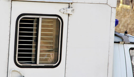 The defendants in the case against the BORN in the prisoner transport vehicle. Moscow, March 18, 2015. Photo by Magomed Tuaev for the "Caucasian Knot" The defendants in the case against the BORN in the prisoner transport vehicle. Moscow, March 18, 2015. Photo by Magomed Tuaev for the "Caucasian Knot"