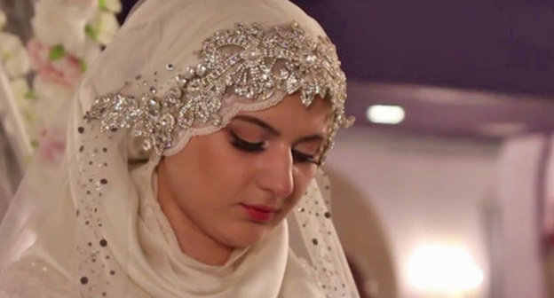 The wedding of the chief of the Nozhai-Yurt ROVD (District Interior Division) and a 17-year-old girl. Grozny, May 16, 2015. Screenshot of a video by the user Caucasian Policy https://www.youtube.com/watch?v=2xpRgf28g90