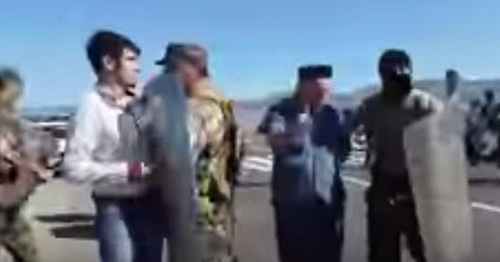 Policemen disperse residents of Korkmaskala village who blocked the highway in Dagestan, August 11, 2015. Screenshot from the video posted by the user Video of Dagestan, http://www.youtube.com/watch?v=2sbsXSLH4Ik Policemen disperse residents of Korkmaskala village who blocked the highway in Dagestan, August 11, 2015. Screenshot from the video posted by the user Video of Dagestan, http://www.youtube.com/watch?v=2sbsXSLH4Ik