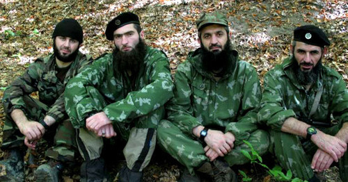 Aslambek Vadalov (second from the right), one of the leaders of the "Imarat Kavkaz" recognized as a terrorist organization. Photo from a website of ‘Imarat Kavkaz’, recognized as a terrorist organization. Aslambek Vadalov (second from the right), one of the leaders of the "Imarat Kavkaz" recognized as a terrorist organization. Photo from a website of ‘Imarat Kavkaz’, recognized as a terrorist organization.