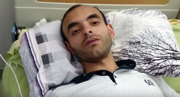 Rasim Aliev in hospital on August 8, 2015. Photo: screenshot of a video MOV 0003, https://www.youtube.com/watch?t=10&v=wigU5a7vRHM Rasim Aliev in hospital on August 8, 2015. Photo: screenshot of a video MOV 0003, https://www.youtube.com/watch?t=10&v=wigU5a7vRHM