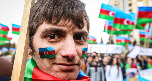 The participant of the anti-crisis rally in Baku. March 15, 2015. Photo by Aziz Karimov for the "Caucasian Knot"
