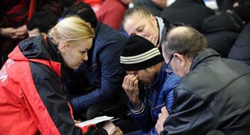 Psychologist talks to relatives of people killed in airplane crash in Rostov-on-Don. Photo: Russia’s Ministry of Emergency Situations. Psychologist talks to relatives of people killed in airplane crash in Rostov-on-Don. Photo: Russia’s Ministry of Emergency Situations.