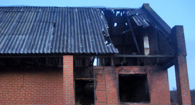 House of the relatives of the militants killed on December 4 in Grozny burned down in the village of Yandi, Achkhoi-Martan District, December 7 2014. Photo provided by the HRC ‘Memorial’ press-service. House of the relatives of the militants killed on December 4 in Grozny burned down in the village of Yandi, Achkhoi-Martan District, December 7 2014. Photo provided by the HRC ‘Memorial’ press-service.
