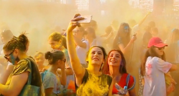 Young people take part in festival of colours in Makhachkala, 2015. Screenshot of video record of MDK Dagestan group in VKontakte social network, Vk.com/video-60302983_171564570 Young people take part in festival of colours in Makhachkala, 2015. Screenshot of video record of MDK Dagestan group in VKontakte social network, Vk.com/video-60302983_171564570
