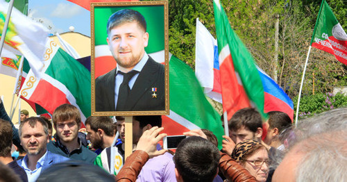 The paricipants of the rally carry Kadyrov's portrait. Grozny, May 2016. Photo by Magomed Magomedobv for the "Caucasian Knot" The paricipants of the rally carry Kadyrov's portrait. Grozny, May 2016. Photo by Magomed Magomedobv for the "Caucasian Knot"