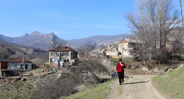 Zinaida Grigoryan visits the grave of her son killed in the April war in 2016. Aykavan village of Hadrut region of Nagorno-Karabakh. January 8, 2017. Photo by Alvard Grigoryan for the "Caucasian Knot" Zinaida Grigoryan visits the grave of her son killed in the April war in 2016. Aykavan village of Hadrut region of Nagorno-Karabakh. January 8, 2017. Photo by Alvard Grigoryan for the "Caucasian Knot"