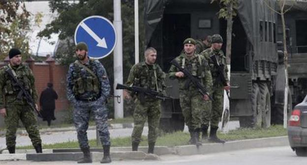 Law enforcers. Grozny. Chechnya. Photo: REUTERS/Alkhan Gargayev Law enforcers. Grozny. Chechnya. Photo: REUTERS/Alkhan Gargayev