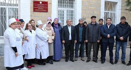Women near the psycho-neurological centre 'Miloserdie' (Charity) and the employees of the centre. Photo by the press service of the Ministry of Labour of Dagestan, http://www.dagmintrud.ru/news/Novosti/Spustyabolshe20letsemyavnovvossoedinilas/ Women near the psycho-neurological centre 'Miloserdie' (Charity) and the employees of the centre. Photo by the press service of the Ministry of Labour of Dagestan, http://www.dagmintrud.ru/news/Novosti/Spustyabolshe20letsemyavnovvossoedinilas/