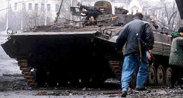 Many of Timur Mutsuraev's songs are dedicated to Chechen war. Photo of Russian IFV destroyed in Grozny, January 1995 made by Mikhail Yevstafiev, https://ru.wikipedia.org/wiki/Первая_чеченская_война Many of Timur Mutsuraev's songs are dedicated to Chechen war. Photo of Russian IFV destroyed in Grozny, January 1995 made by Mikhail Yevstafiev, https://ru.wikipedia.org/wiki/Первая_чеченская_война