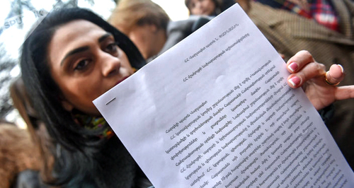 Tatevik Sukaisyan, an employee of the Ministry of Culture, in front of the Armenian Government building in Yerevan, December 21, 2018. Photo: Sputnik/ Asatur Yesayants. https://ru.armeniasputnik.am/society/20181221/16367163/zabastovka-i-akciya-protesta-v-yerevan-sotrudniki-ministerstv-nedovolny-planami-pashinyan.html Tatevik Sukaisyan, an employee of the Ministry of Culture, in front of the Armenian Government building in Yerevan, December 21, 2018. Photo: Sputnik/ Asatur Yesayants. https://ru.armeniasputnik.am/society/20181221/16367163/zabastovka-i-akciya-protesta-v-yerevan-sotrudniki-ministerstv-nedovolny-planami-pashinyan.html