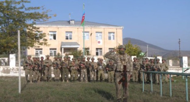 The military reported to the President of Azerbaijan on the establishment of control over the city of Zangilan 
in Nagorno-Karabakh, October 20, 2020. Screenshot of the video posted at the DTX official YouTube channel https://www.youtube.com/watch?v=nvRyXmkQL7s&amp;feature=emb_logo