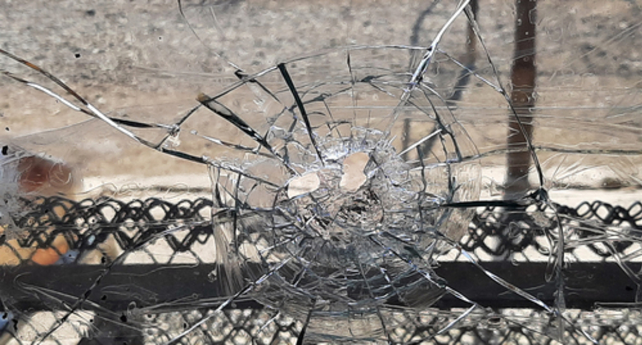 A bullet hole in the window of a home in the village of Krasny Bazar. Photo by Alvard Grigoryan for the "Caucasian Knot" A bullet hole in the window of a home in the village of Krasny Bazar. Photo by Alvard Grigoryan for the "Caucasian Knot"