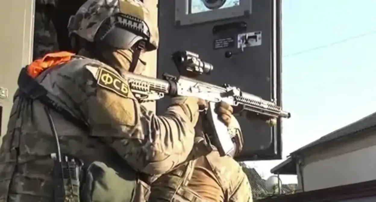 The Russian FSB (Federal Security Bureau) officer. Photo by the press office of the Russian National Antiterrorism Committee (NAC) http://nac.gov.ru/sites/default/files/styles/full_size/public/epizod_08.00_03_24_10.nepodvizhnoe_izobrazhenie035.jp The Russian FSB (Federal Security Bureau) officer. Photo by the press office of the Russian National Antiterrorism Committee (NAC) http://nac.gov.ru/sites/default/files/styles/full_size/public/epizod_08.00_03_24_10.nepodvizhnoe_izobrazhenie035.jp