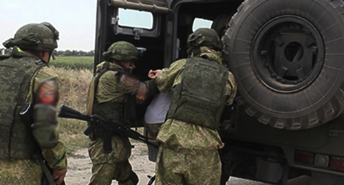 Law enforcers detain a suspect. Photo: https://function.mil.ru Law enforcers detain a suspect. Photo: https://function.mil.ru