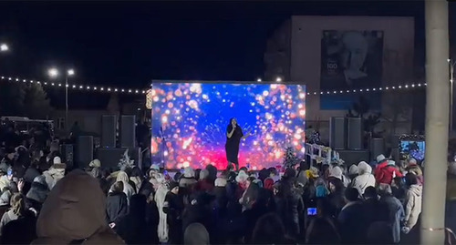 Mass New Year celebrations in a square in Derbent. Screenshot of the video https://vk.com/wall-74219800_2203650 Mass New Year celebrations in a square in Derbent. Screenshot of the video https://vk.com/wall-74219800_2203650