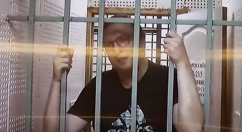 Dmitry Novikov. Screenshot of a video by the "Caucasian Knot" https://www.youtube.com/watch?v=Y_frtEWrPeg Dmitry Novikov. Screenshot of a video by the "Caucasian Knot" https://www.youtube.com/watch?v=Y_frtEWrPeg