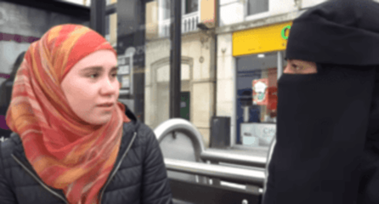 Girls wearing hijab (left) and niqab (right). Screenshot of a video posted by the Alif TV on May 26, 2024 https://www.youtube.com/watch?v=Jh9qtTOE6p0&t=62s Girls wearing hijab (left) and niqab (right). Screenshot of a video posted by the Alif TV on May 26, 2024 https://www.youtube.com/watch?v=Jh9qtTOE6p0&t=62s