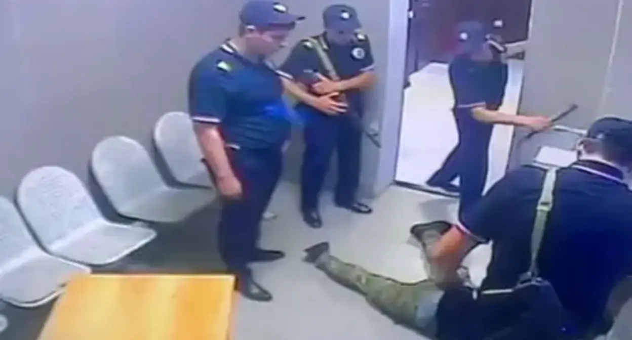 Law enforcers physically assault Akhmed Djabrailov, detained by police. Screenshot of a video by the Russian Ministry of Internal Affairs Law enforcers physically assault Akhmed Djabrailov, detained by police. Screenshot of a video by the Russian Ministry of Internal Affairs