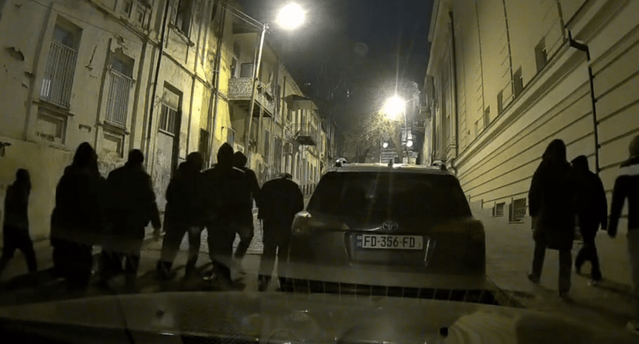 A dashboard camera captured one of the groups of attackers in Tbilisi. Screenshot of a video posted on Nikolay Levshits' Telegram channel on December 7, 2024, https://t.me/nlevshitstelegram/20921 A dashboard camera captured one of the groups of attackers in Tbilisi. Screenshot of a video posted on Nikolay Levshits' Telegram channel on December 7, 2024, https://t.me/nlevshitstelegram/20921