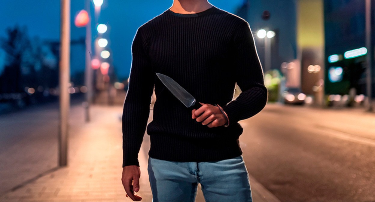 A man with a knife. Picture made in Photoshop by the "Caucasian Knot"