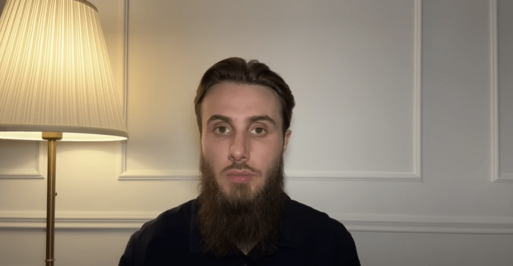 Mukhammad Abdurakhmanov. A frame from a video posted on his YouTube channel on May 1, 2025, https://www.youtube.com/watch?v=J61t-BH8AKo.
Mukhammad Abdurakhmanov. A frame from a video posted on his YouTube channel on May 1, 2025, https://www.youtube.com/watch?v=J61t-BH8AKo.
