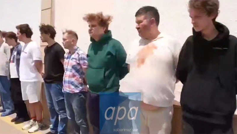 Still from a video of Russians detained in Azerbaijan. July 1, 2025. Screenshot of the video https://t.me/apa_az/100157