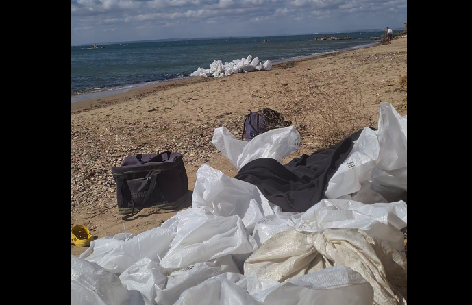 Collected sacks of fuel oil at Cape Tuzla. Screenshot from the Dolphins headquarters video from September 26, 2025, https://t.me/shtab_delfin/1235