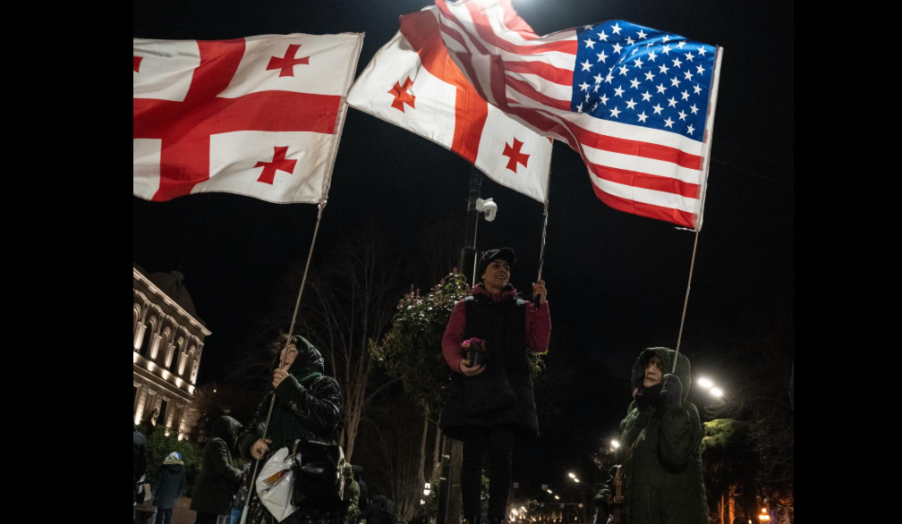 Protesters outside the Georgian parliament. Screenshot from Publika photo from March 8, 2026, https://www.facebook.com/photo?fbid=1700617584671118&set=pb.100041686795244.-2207520000 (Meta, the company that owns the social network, is banned in Russia).