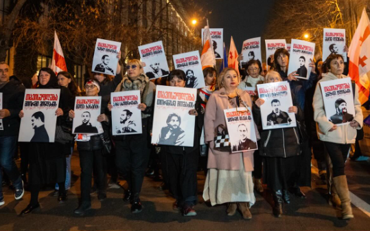 Participants in the march holding portraits of political prisoners. Screenshot from Publika photo from March 14, 2026, https://www.facebook.com/photo?fbid=1705536594179217&set=pb.100041686795244.-2207520000 (Meta, the company that owns the social network, is banned in Russia). Participants in the march holding portraits of political prisoners. Screenshot from Publika photo from March 14, 2026, https://www.facebook.com/photo?fbid=1705536594179217&set=pb.100041686795244.-2207520000 (Meta, the company that owns the social network, is banned in Russia).