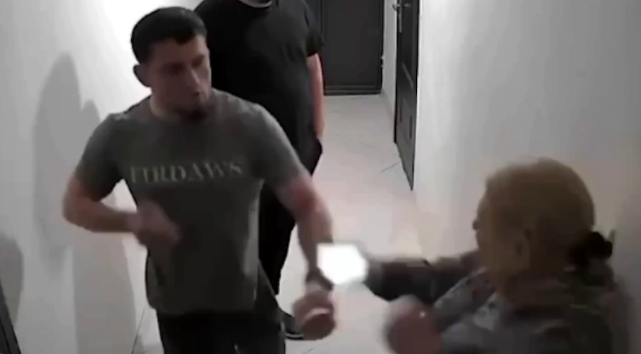 An Akhmat fighter beats a woman. Still from Sapa Kavkaz, May 16, 2026, https://t.me/sapakavkaz/7165.
