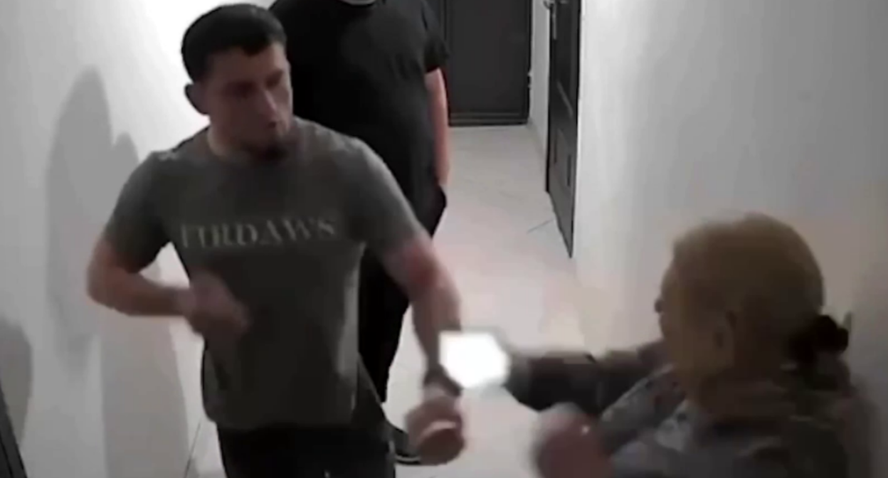 An Akhmat fighter beats a woman. Still from Sapa Kavkaz, May 16, 2026, https://t.me/sapakavkaz/7165.