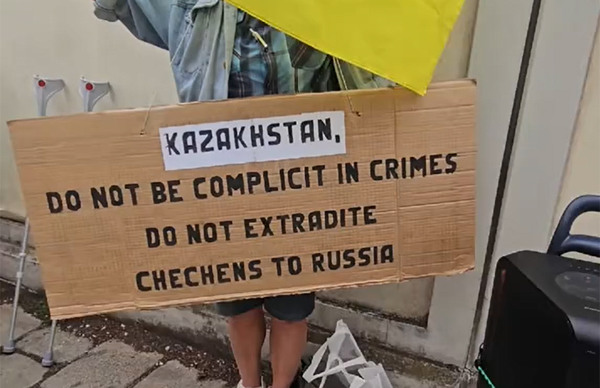 A protester in Vienna holds a banner calling on the Kazakh authorities. Screenshot from https://www.instagram.com/p/DZkW4qPJGVo/ (Meta (owner of Facebook, Instagram, and WhatsApp) is banned in Russia).