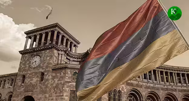 The flag of Armenia against the backdrop of the parliament building. The illustration was created by "Caucasian Knot" using AI in the Copilot program.