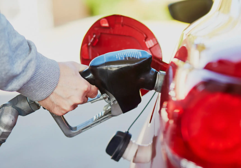 Filling up a car. Screenshot from photo https://www.torquedetail.com/blogs/car-detailing/the-top-6-paint-enemies-to-eliminate-fast?utm_medium=organic&utm_source=yandexsmartcamera. Filling up a car. Screenshot from photo https://www.torquedetail.com/blogs/car-detailing/the-top-6-paint-enemies-to-eliminate-fast?utm_medium=organic&utm_source=yandexsmartcamera.