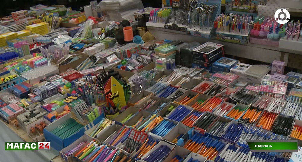 Stationery at the market in Nazran. Frame from the video report of the "Magas" TV channel https://magas.tv/news/skolnyi-soping-po-ingusski-kak-sobrat-rebenka-k-1-sentiabria-i-ne-razoritsia?utm_source=chatgpt.com