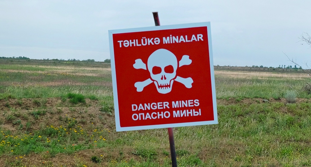 A sign warning of mine danger. Photo: Azerbaijan Mine Clearance Agency https://anama.gov.az/news/453 A sign warning of mine danger. Photo: Azerbaijan Mine Clearance Agency https://anama.gov.az/news/453