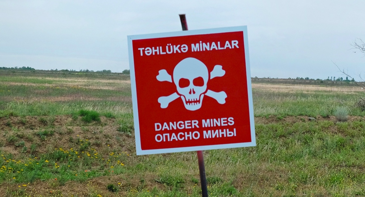 A sign warning of mine danger. Photo: Azerbaijan Mine Clearance Agency https://anama.gov.az/news/453 A sign warning of mine danger. Photo: Azerbaijan Mine Clearance Agency https://anama.gov.az/news/453