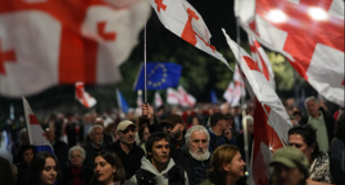Participants of the procession in Tbilisi. Screenshot from Publika 10.10.26,https://www.facebook.com/photo?fbid=1896319685100906&set=pb.100041686795244.-2207520000 (Meta's activities, which owns the social network, are banned in Russia)