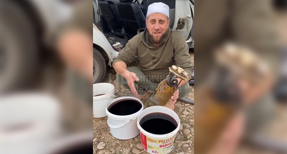 The driver demonstrates the quality of gasoline in the video. Frame from the video https://www.instagram.com/chpdagestana/reel/DeyTz49gYYs (the activities of the Meta company (owner of Facebook, Instagram, and WhatsApp) are banned in Russia) The driver demonstrates the quality of gasoline in the video. Frame from the video https://www.instagram.com/chpdagestana/reel/DeyTz49gYYs (the activities of the Meta company (owner of Facebook, Instagram, and WhatsApp) are banned in Russia)